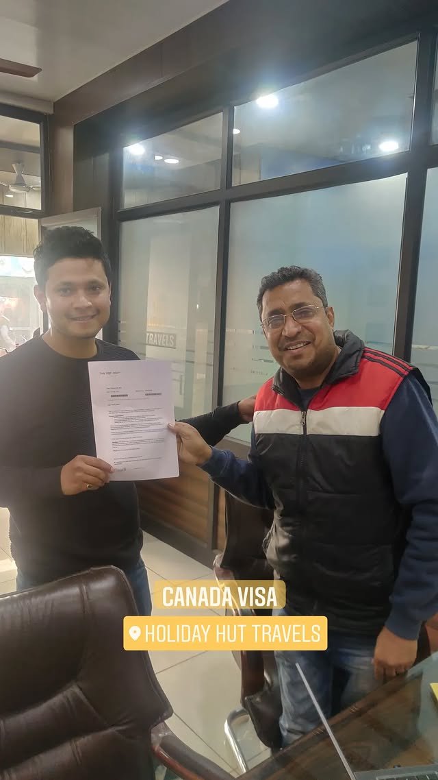 Canada visa handover at Holiday Hut Travels office